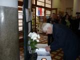 Deputy prime minister Rudolf Chmel in the Secondary Grammar School of Ivan Bella signs the book of condolence as a tribute to student victims of a recent tragic car crash.