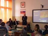 Deputy prime minister Rudolf Chmel delivers a speech in the Secondary Grammar School.